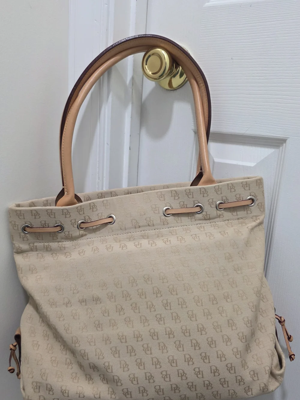 Dooney & Bourke Beige Canvas Tote with Tan Leather Trim